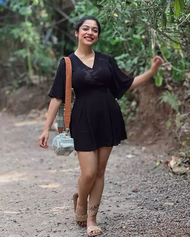 Varsha Bollamma Charms in a Casual Black Dress