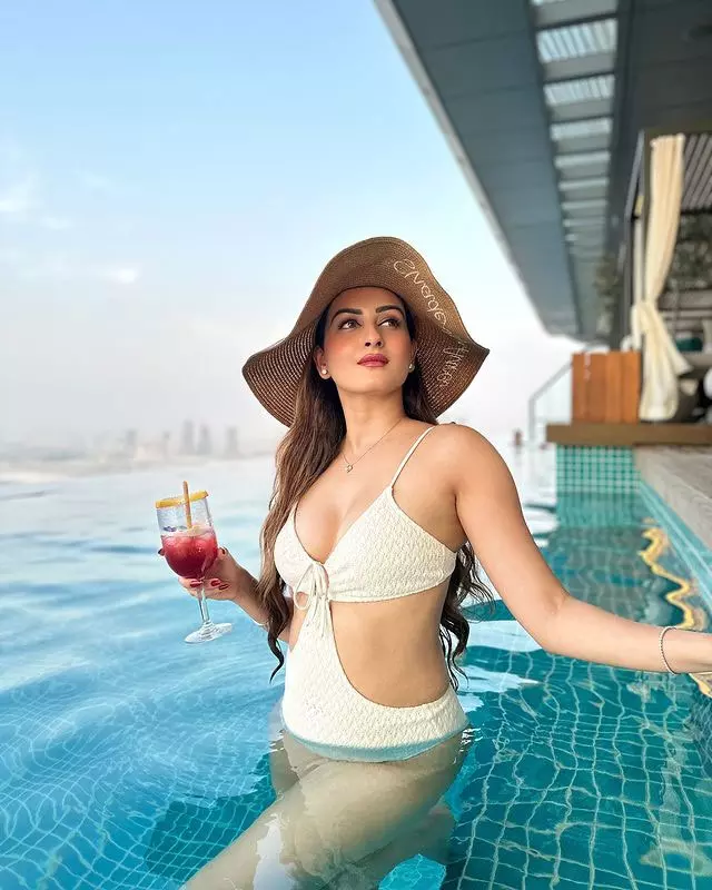 Zaara Yesmin Stuns in Elegant Poolside Photoshoot Zaara Yesmin Stuns in Elegant Poolside Photoshoot