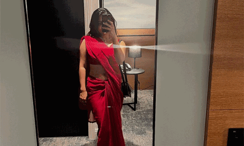 Esther Anil Glows in Red Charm with a Balloon Touch