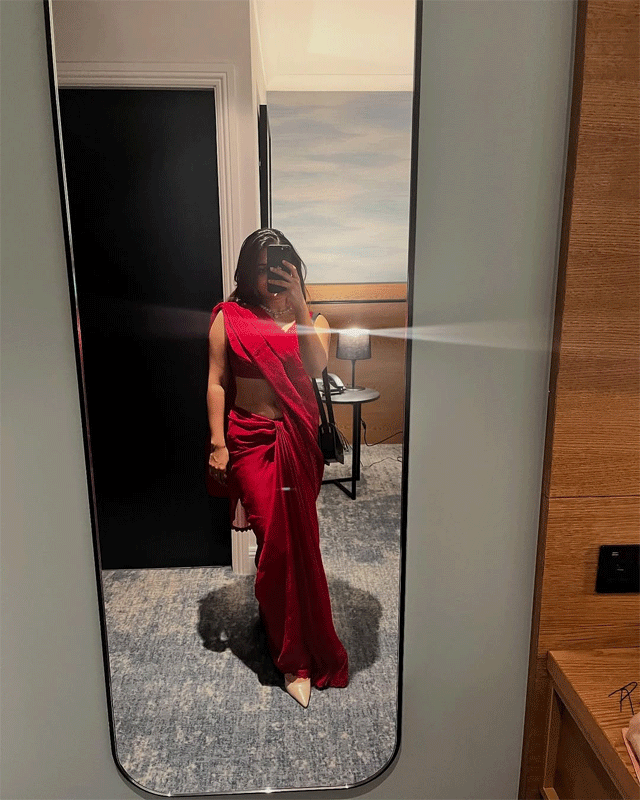 Esther Anil Glows in Red Charm with a Balloon Touch