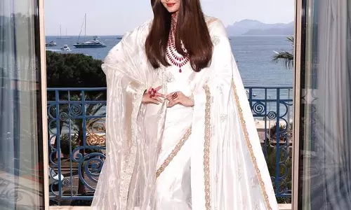 Aishwarya Rai Bachchan Stuns in Ivory Banarasi Saree at Cannes 2025