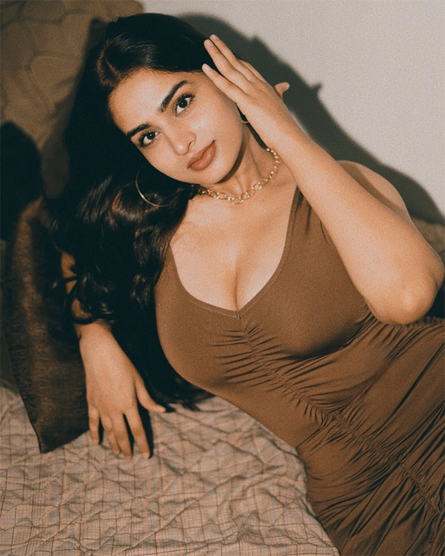 Ayesha turns up the heat in a fiery red shimmer gown