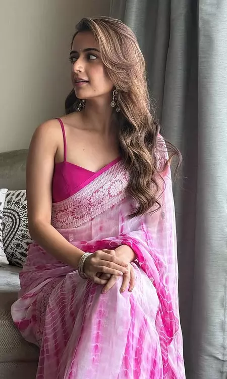Ashika Ranganath Shares Candid Photo in Pink Tie-Dye Saree