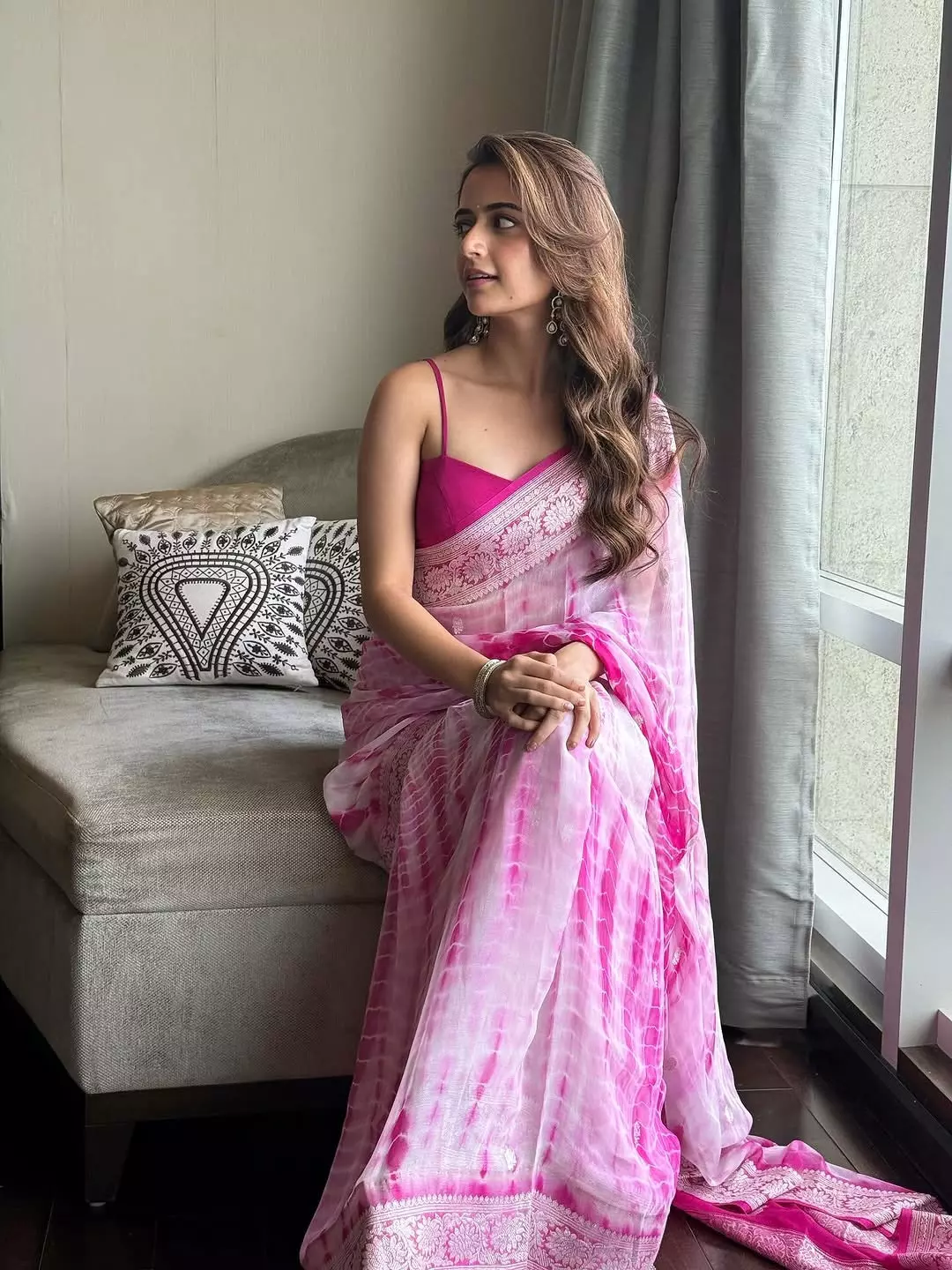 Ashika Ranganath Shares Candid Photo in Pink Tie-Dye Saree