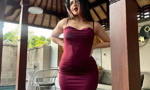 Iswarya Menon shines under thatched rooftop