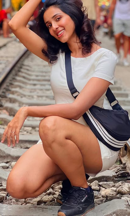 Riya Suman Enjoys the Iconic Hanoi Train Street Experience