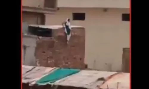 హోటల్  లో ప్రియుడితో ఉండగా వచ్చిన భర్త... వివాహిత వీడియో  వైరల్!