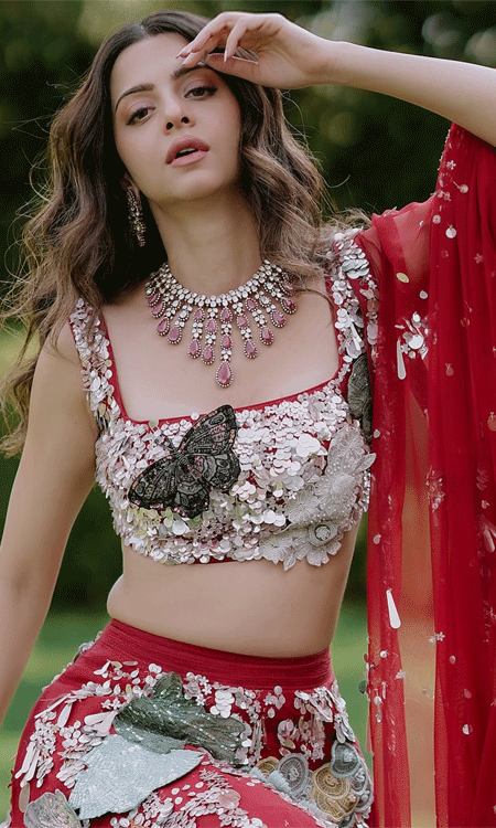 Vedhika Slays in Red Embroidered Lehenga in Her Latest Reel