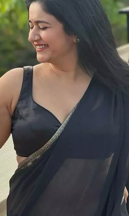 Poonam Bajwa Glows in Classic Black Saree, Embodying Elegance and Confidence