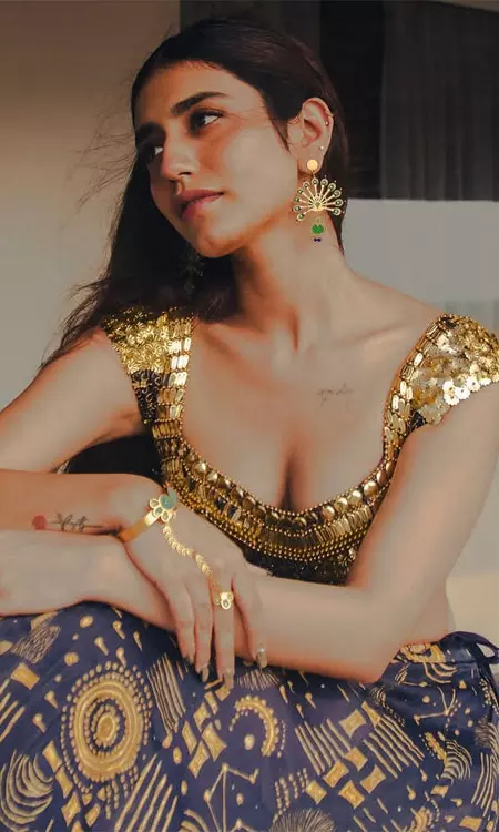 Priya Prakash Varrier Glows in a Golden Traditional Look by the Beach