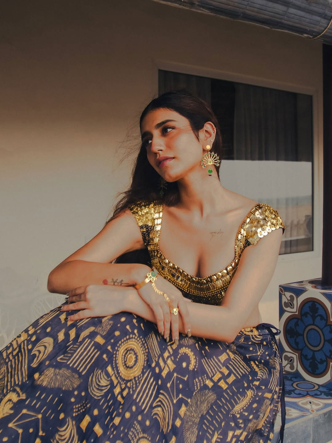 Priya Prakash Varrier Glows in a Golden Traditional Look by the Beach