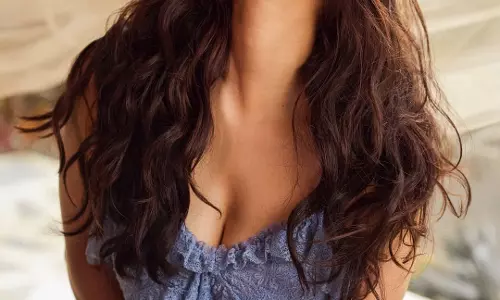 Nabha Natesh Shares Dreamy Clicks in Lavender Lace Dress