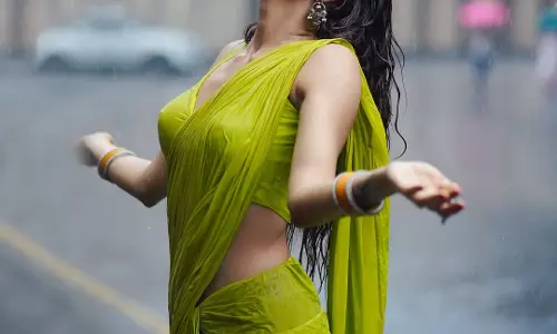 Nidhi Tapadia Dazzles in Rainy Saree Shoot |