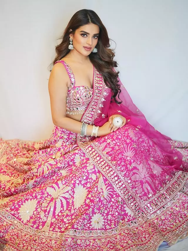Nidhhi Agerwal Slays The Pink And Purple