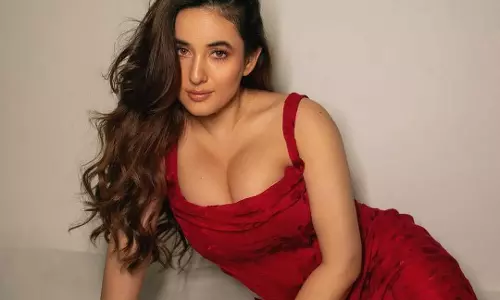 Scarlet Glam: Aditi Budhathoki�s Radiant Charm