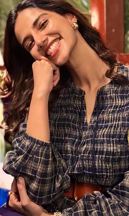 Meenakshi Chaudhary�s Checkered Charm & Radiant Smile