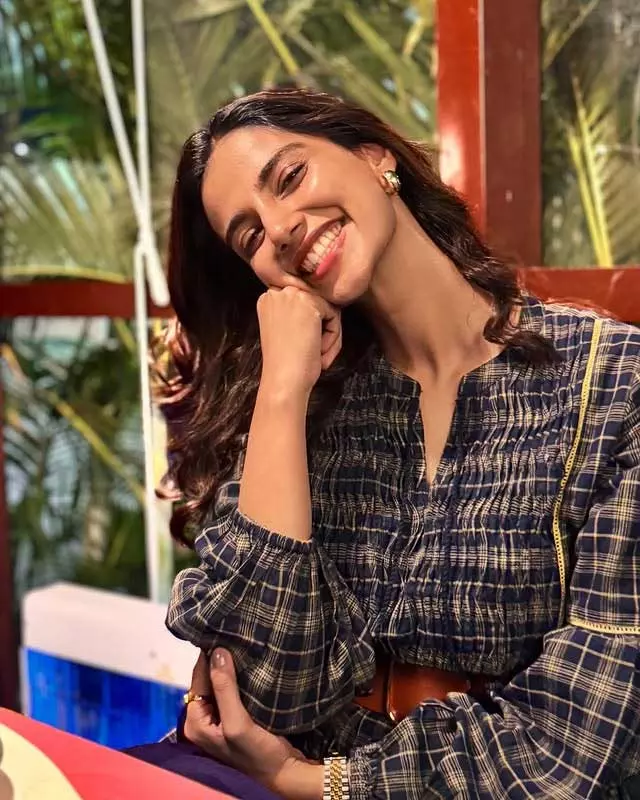 Meenakshi Chaudhary�s Checkered Charm & Radiant Smile Meenakshi Chaudhary�s Checkered Charm & Radiant Smile