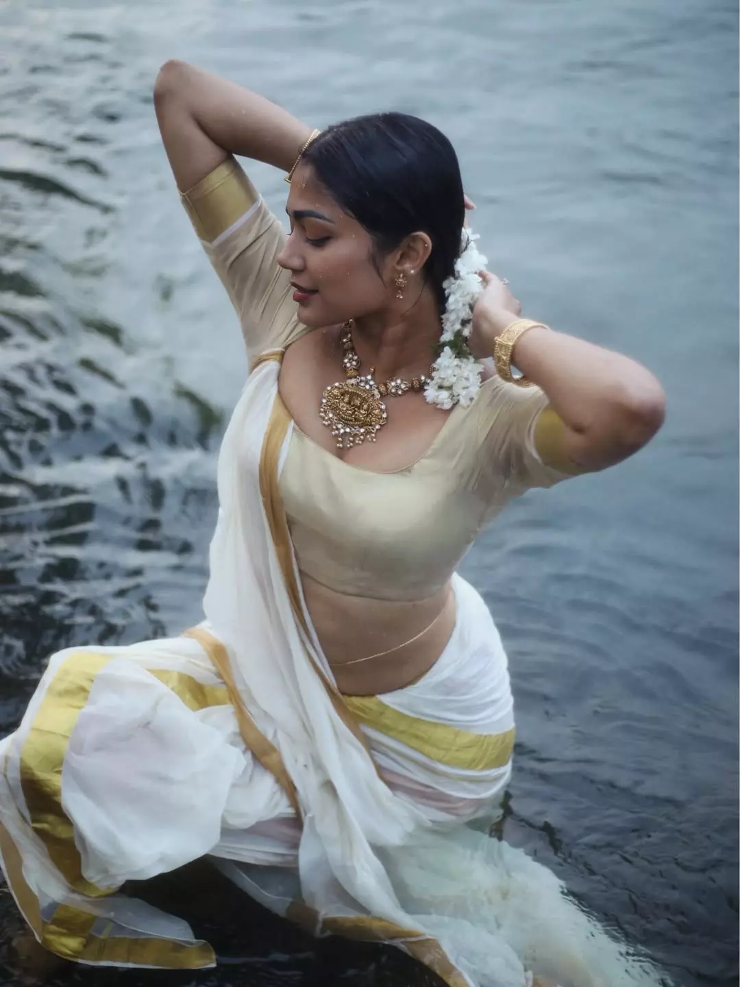 Payal Radhakrishna Adores in White and Gold Saree by the Water