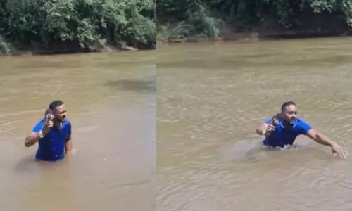 ఛాతీ లోతు నీటిలో లైవ్  రిపోర్టింగ్... షాకింగ్  వీడియో!