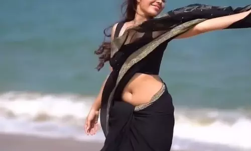 Kushitha Kallapu Mesmerizes in Black Saree by the Shore