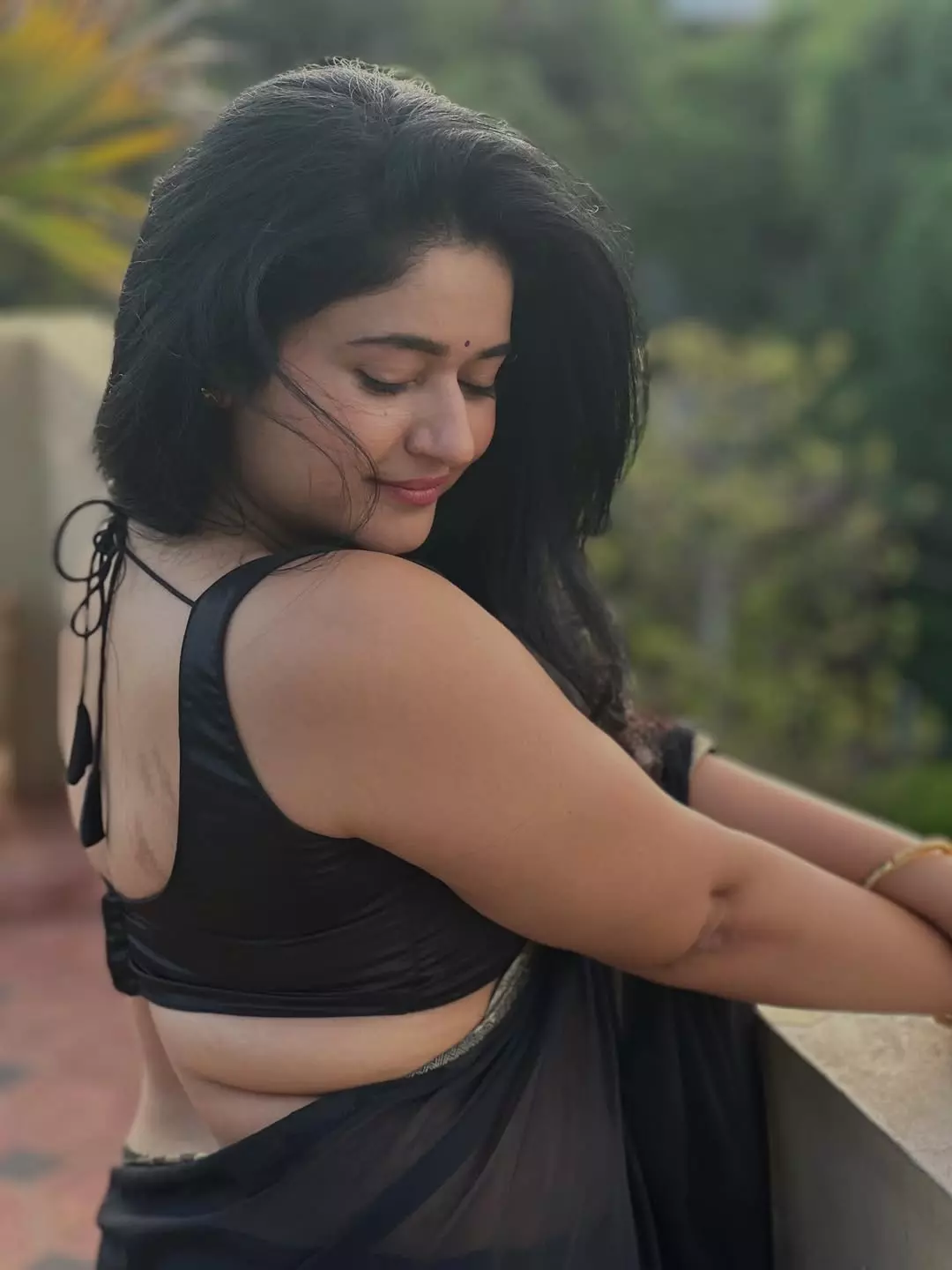 Poonam Bajwa Radiates Simplicity and Charm in a Classic Black Saree
