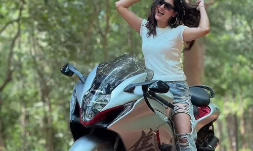Payal Rajput Gets on To The Bike in Style
