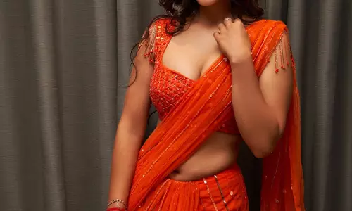 Kavya Thapar’s Orange Saree Looks