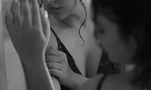 Nandita Swetha Sizzles In Monochrome Wet Look