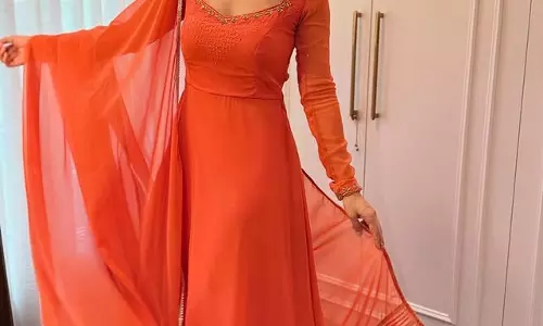 Nidhi Shah Stuns in Vibrant Orange Ethnic Elegance