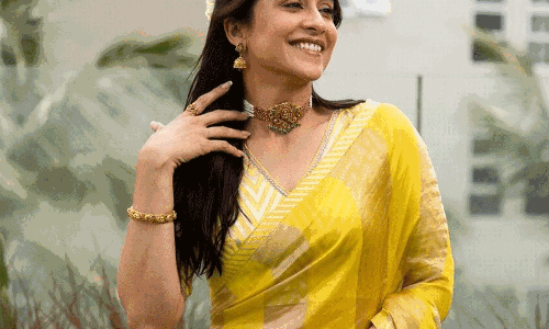 Regina Cassandra As Yellow Saree Diva with Timeless Grace