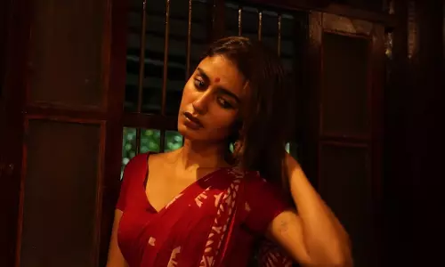Priya Prakash Varrier Captures Hearts with Traditional Red Saree Priya Prakash Varrier Captures Hearts with Traditional Red Saree