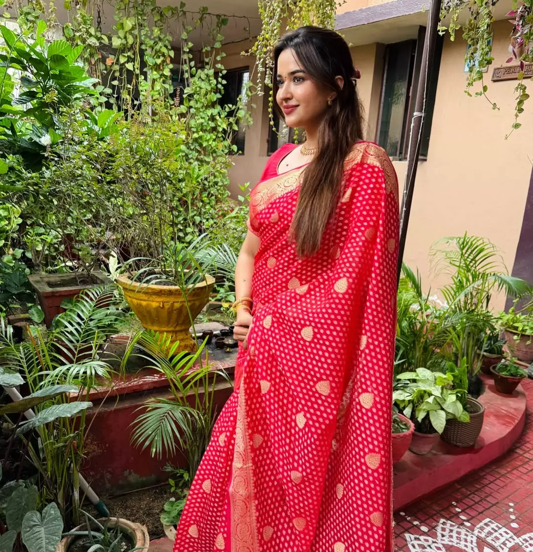 Pujita Ponnada Celebrates Varalakshmi Vratam in a Red Saree Pujita Ponnada Celebrates Varalakshmi Vratam in a Red Saree