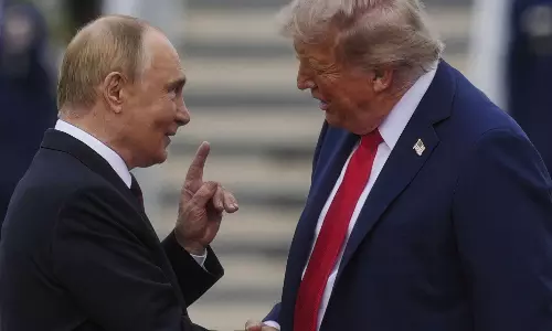 లీక్  షాక్.. పబ్లిక్‌  ప్రింటర్‌  వద్ద ట్రంప్ – పుతిన్  భేటీ రహస్య వివరాలు!