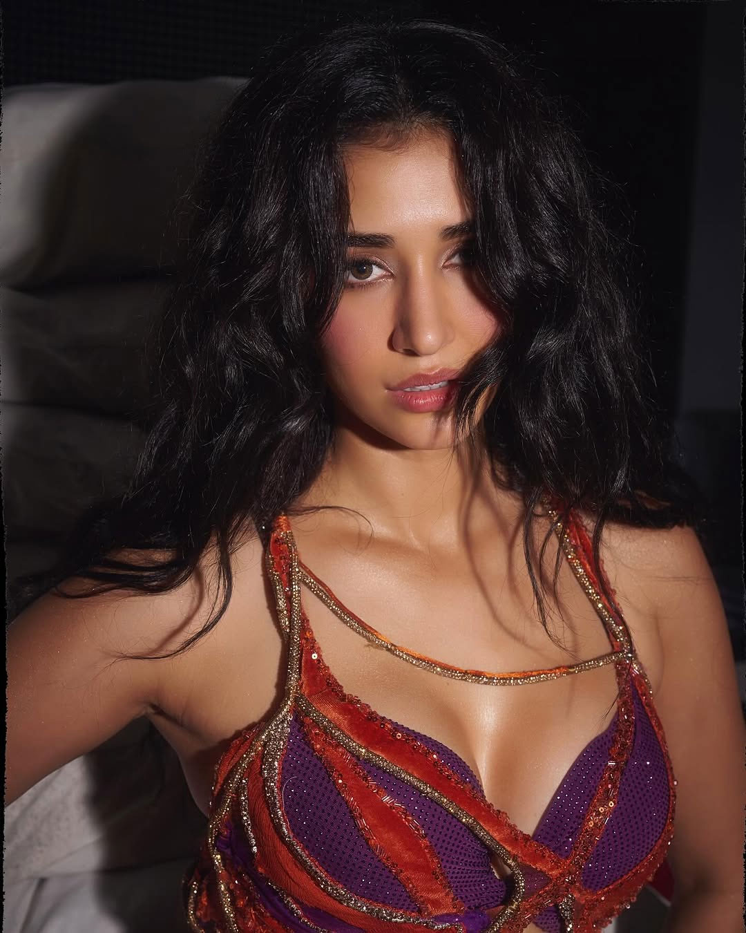 Disha Patani fiery photos in red and purple