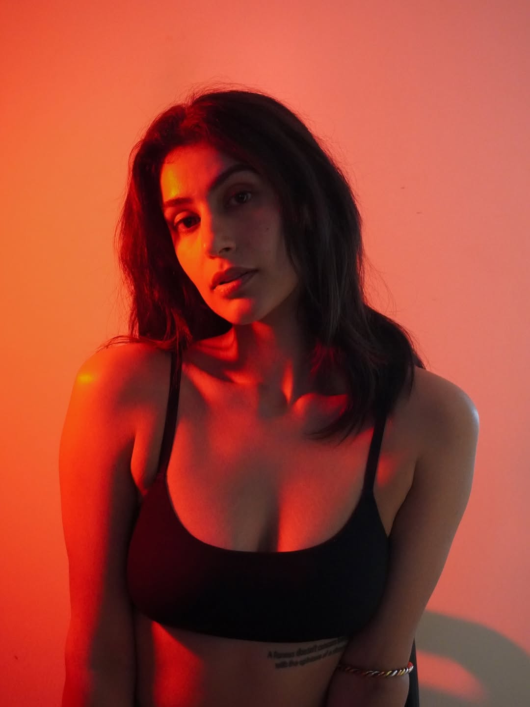 Sonia Rathee Glows in Red Light Portrait Capture Sonia Rathee Glows in Red Light Portrait Capture