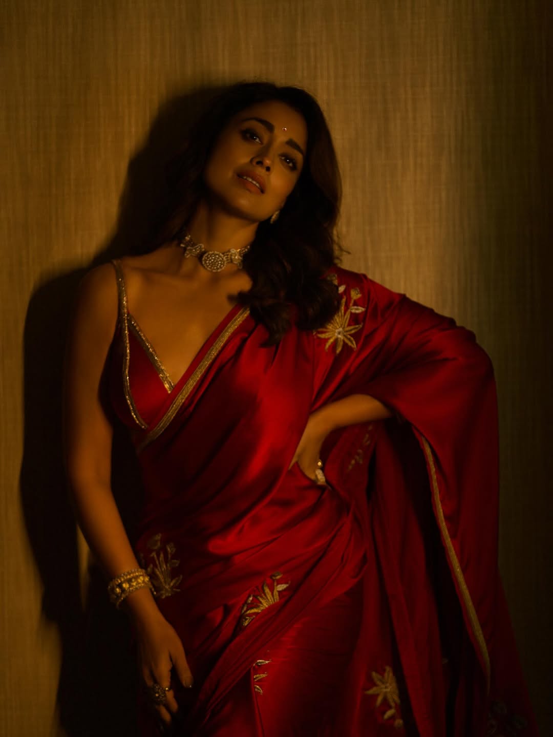 Shriya Saran shines in a red sari look Shriya Saran shines in a red sari look