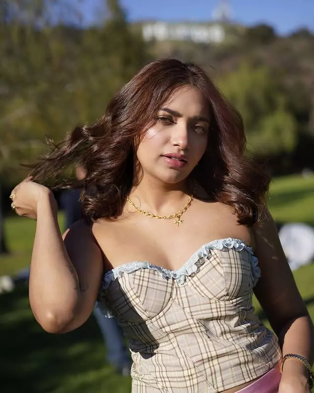 Jiyaa Shankar Stuns in Red Saree Photoshoot