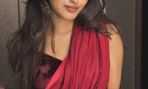 Pranavi Manukonda Glows In Red Saree Magic