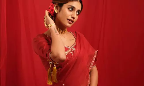 Priya P Varrier’s Stunning Red Saree Look This Diwali