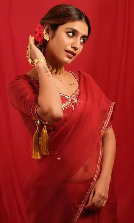 Priya P Varrier’s Stunning Red Saree Look This Diwali