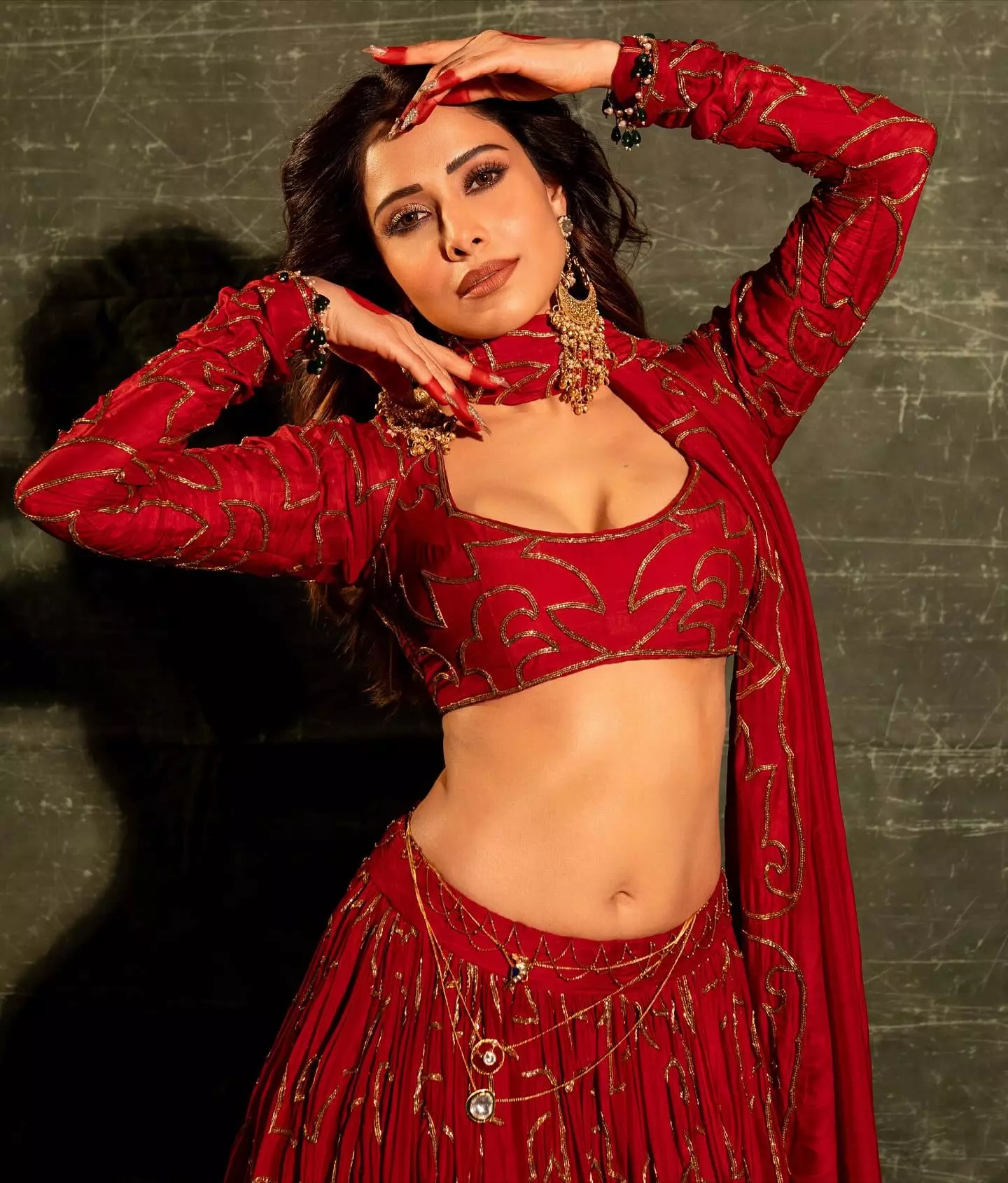 Radiant in Red: Nushrratt Bharuccha Sets the Screen on Fire