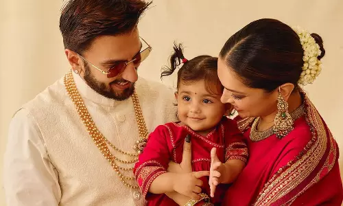 ఎట్టకేలకు కూతుర్ని పరిచయం చేసిన దీపిక - రన్వీర్... ఎంత క్యూట్ గా వుందో!