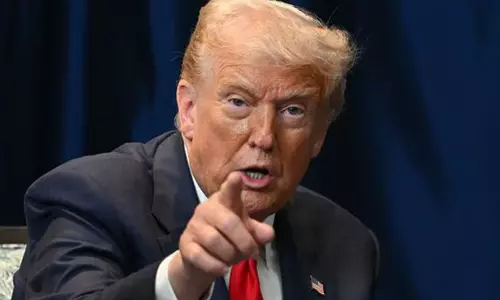 కుక్కలా పని చేస్తున్నారంటూ పోస్ట్.. థాంక్స్ చెప్పిన ట్రంప్.. అంతా అవాక్కు