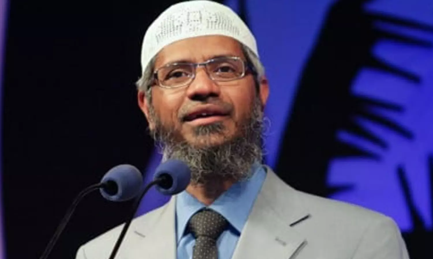 జకీర్ నాయక్ కు ఆ దేశంలో నో ఎంట్రీ.. కారణం ఏంటి..?