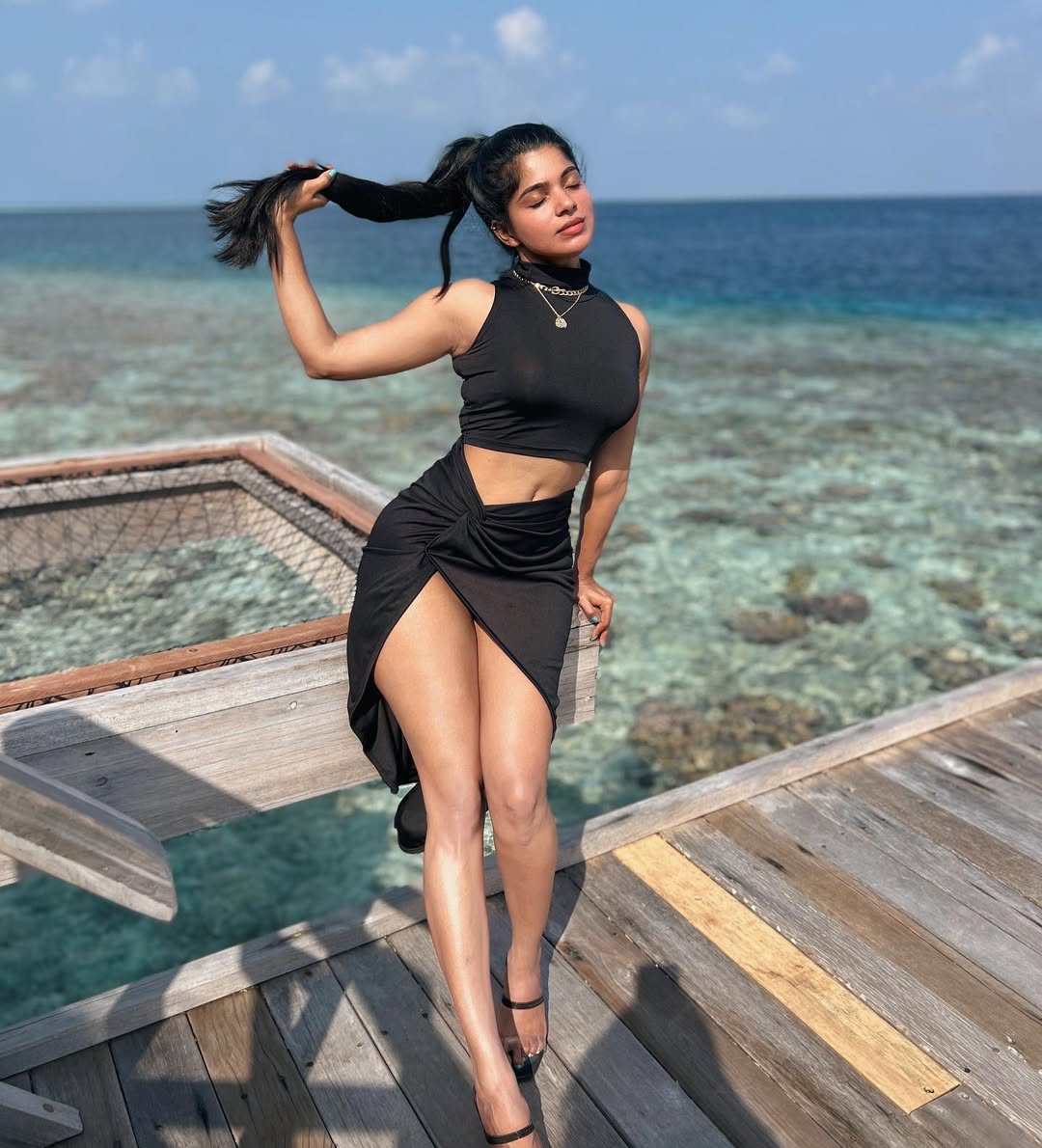 Divya Bharathi Redefines Island Glamour in a Bold Black Two-Piece
