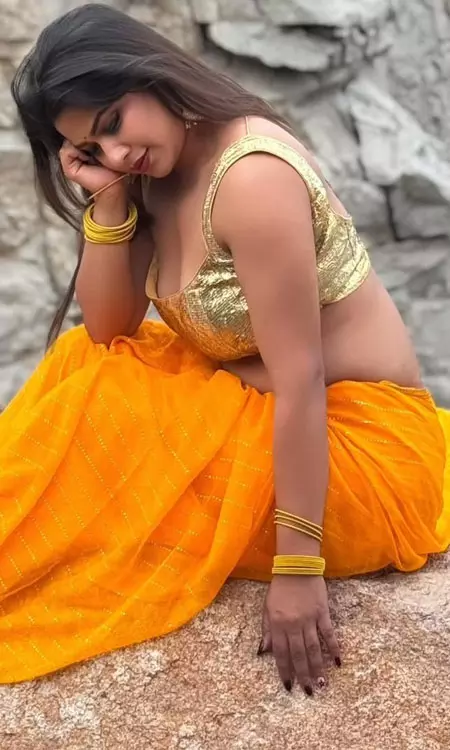 Inaya Sulthana Radiates Sunshine Elegance in a Golden Saree Look