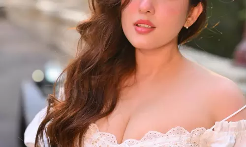 Aditi Budhathoki Shines in Dreamy White Lace: A Visual Poem at Golden Hour