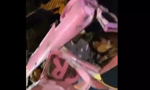 క్రేన్  కి వేలాడిన పింక్  కలర్  ‘కారు’...  వీడియో, కామెంట్లు వైరల్!