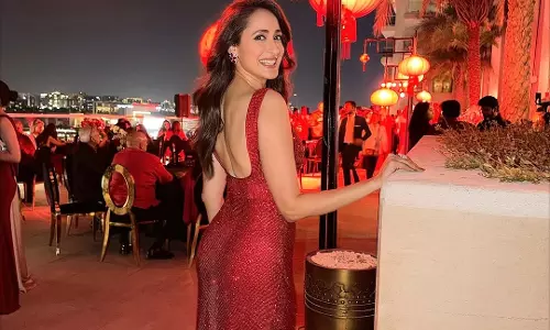 pragya jaiswal stuns in crimson gown at chinatown