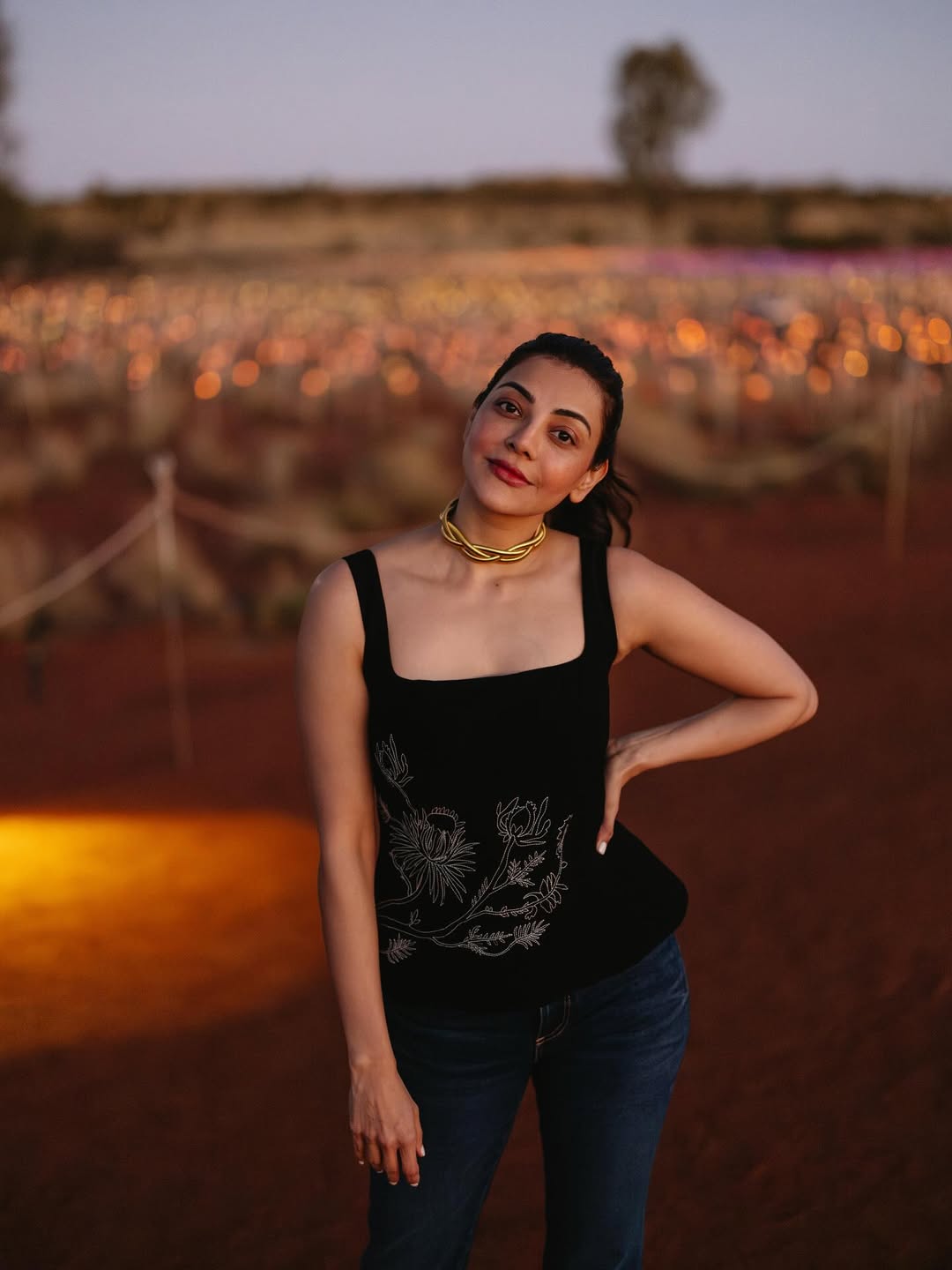 Kajal Aggarwal Explores Australias Red Centre in Chic Black Outfits